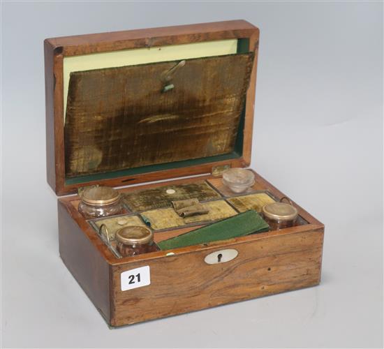 An early 19th century rosewood work box, with fitted interior